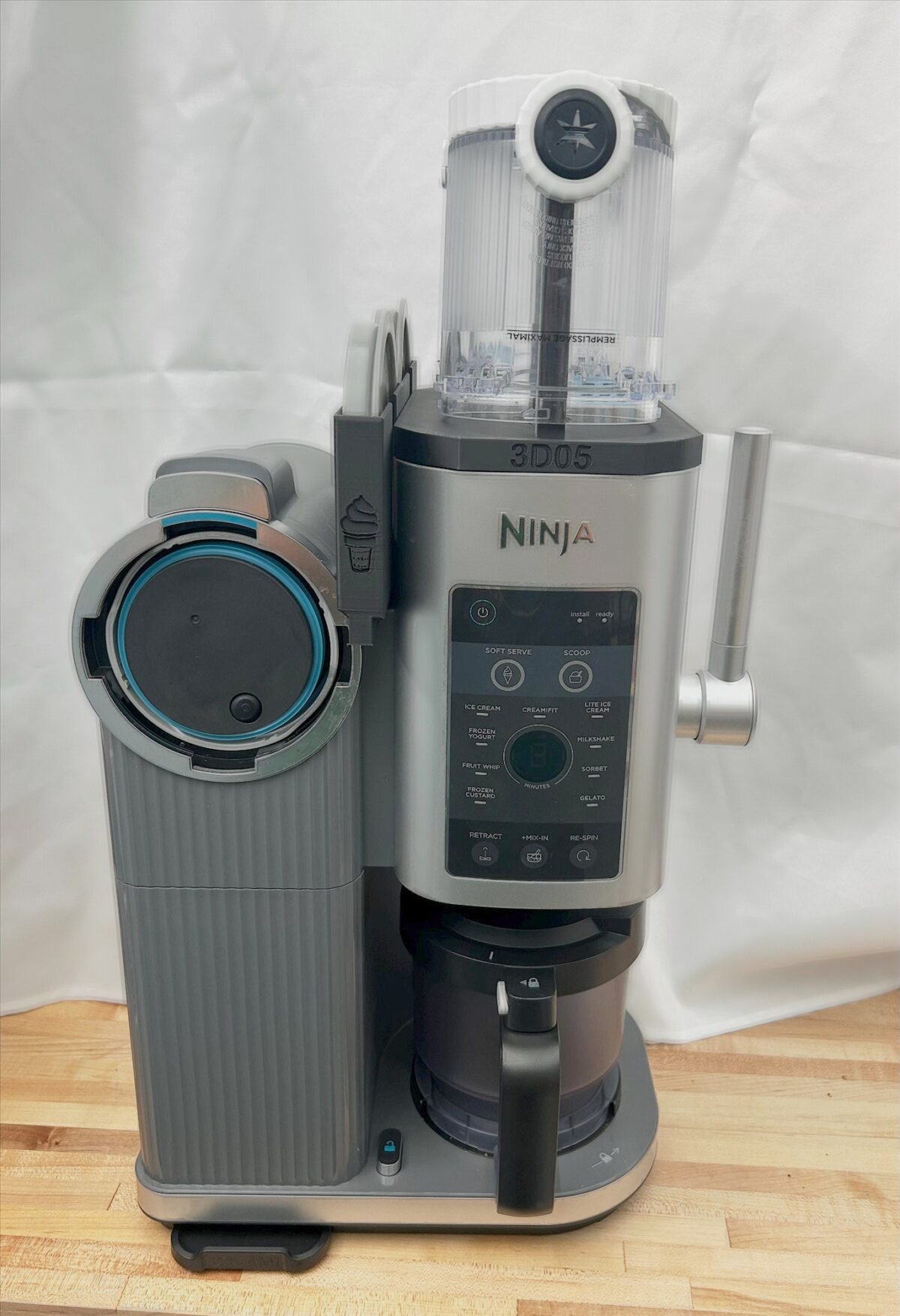 Ninja Swirl pint organizer holding two pint containers on the machine