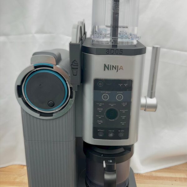 Ninja Swirl pint organizer holding two pint containers on the machine